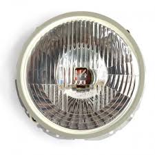 FARO DELANTERO IZQUIERDO Y DERECHO HELLA VOLKSWAGEN SEDAN 74/04 COMBI 76/01 COLOR TRANSPARENTE CRISTAL LISO RAYADO EN REFLECTOR NO INCLUYE FOCO = 111941041TPRIS BRUCK